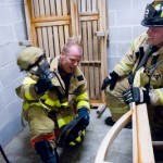 Stamford Fire & Rescue firefighters Jimmy Tarzi and Alan Hagander catch their breath. Stamford Fire & Rescue firefighters Jimmy Tarzi and Alan Hagander catch their breath.